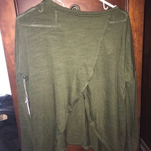 Never worn light sweater with open back